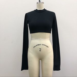 fenty puma crop top with extra long sleeves.